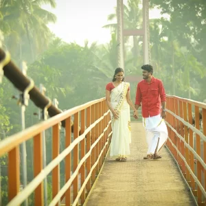 Kerala Lovers Paradise - couple walking on a bridge in Kerala