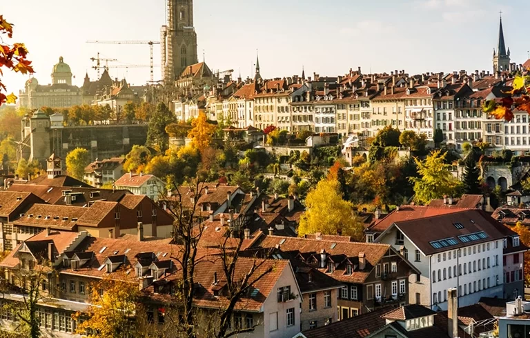 City of Bern, Münster, Aare and Federal Palace in autumn, Switzerland