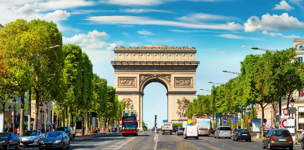 Road of Champs Elysee leading to Arc de Triomphe in Paris, France