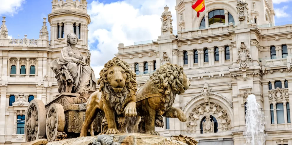 The Plaza de Cibeles is a square with a neo-classical complex of marble sculptures with fountains that has become an iconic symbol for the city of Madrid.