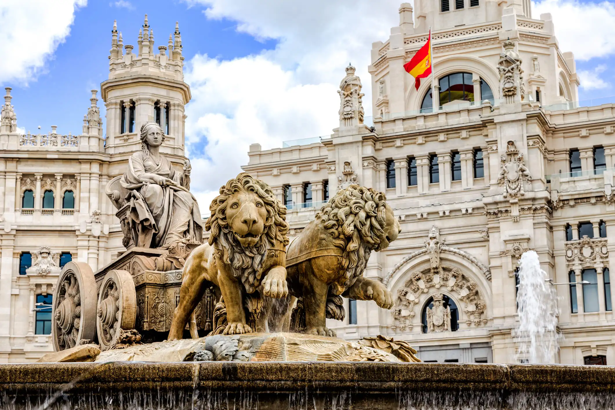 The Plaza de Cibeles is a square with a neo-classical complex of marble sculptures with fountains that has become an iconic symbol for the city of Madrid.
